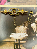 9K vintage garnet and seed pearl brooch