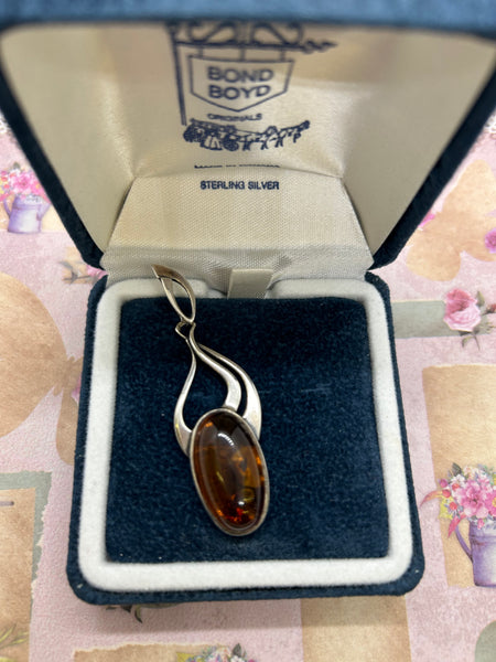 Sterling Silver Red Amber Pendant - Oval Shaped