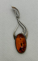 Sterling Silver Red Amber Pendant - Oval Shaped