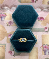 10K pear shaped blue topaz ring