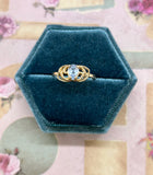 10K pear shaped blue topaz ring