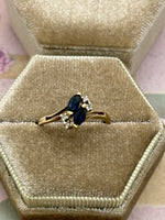 10K marquise shaped sapphire ring