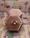 10K oval pink stone ring