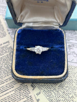 14K white gold 0.70 ctw diamond ring with four side tapered baguettes diamond ring