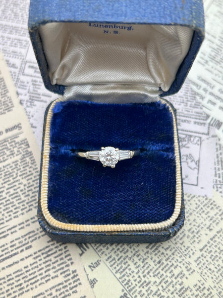 14K white gold 0.70 ctw diamond ring with four side tapered baguettes diamond ring