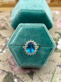 14k yellow gold blue topaz ring with diamond accents
