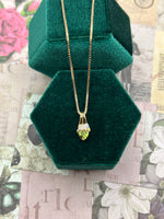 10K peridot and diamond pendant necklace