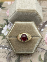 10K oval ruby (synthetic) ring