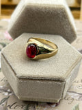 10K oval ruby (synthetic) ring