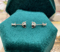 0.30 ctw diamond earrings with screwback post